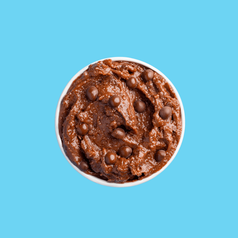 
                  
                    La cookie dough saveur brownie est fondante et crémeuse. Un cacao intense et une texture onctueuse.
                  
                